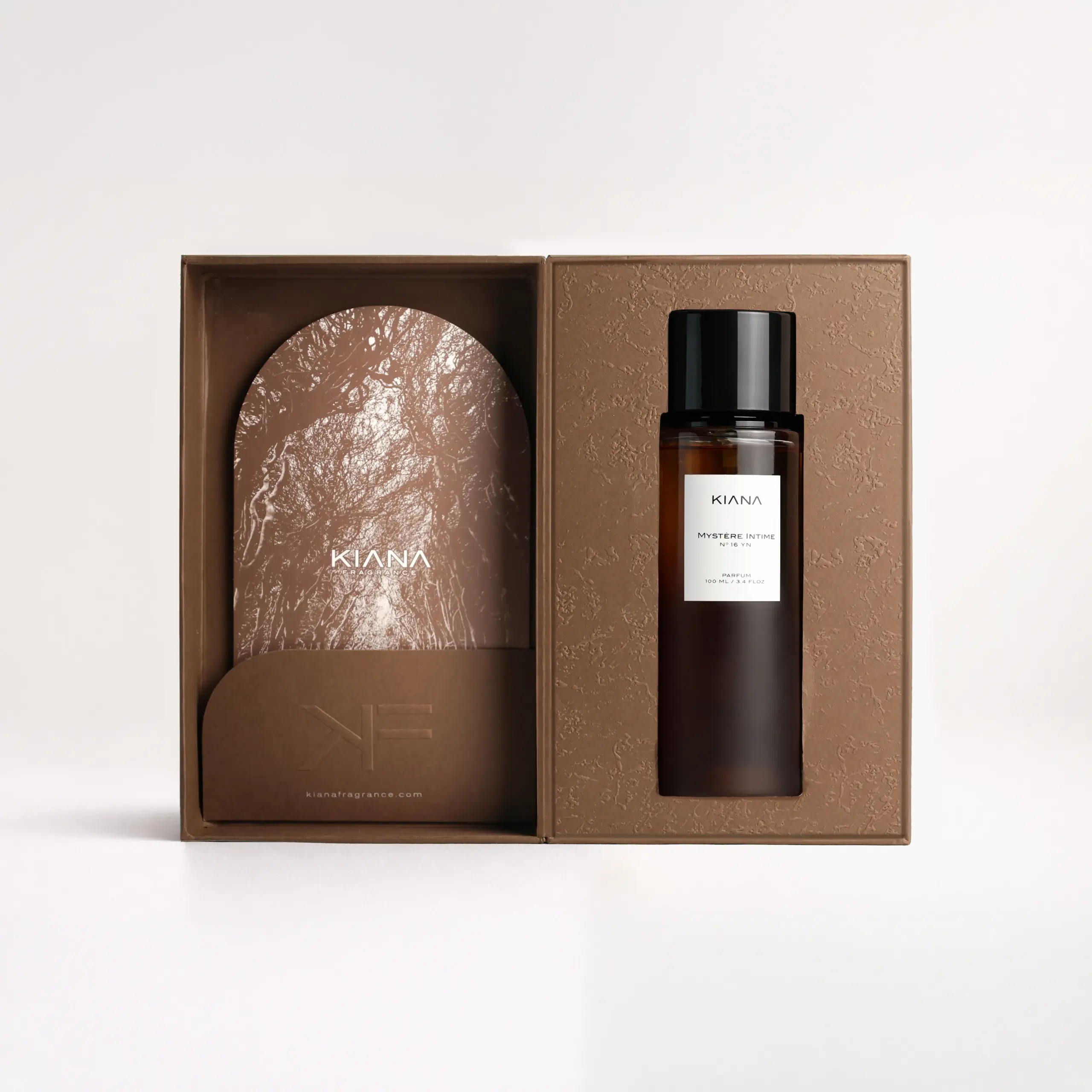 Kiana Mystère Intime N°16 perfume in deep brown hard textured box with frosted glass bottle and luxury packaging